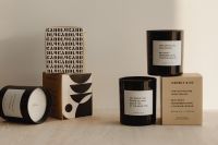 Kaboompics - Scented Candles Styled on White Textile Background