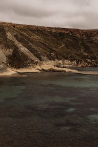 Kaboompics - Weathered Coastal Cliffs Beneath a Cloudy Sky
