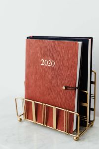 Kaboompics - Close-Up of Red 2020 Planner on Marble with Copy Space