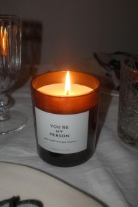 Kaboompics - Close Up Burning Amber Candle on Table