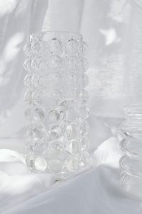 Kaboompics - Textured Bubble Glass Vases Styled on White Draped Fabric