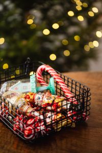 Kaboompics - Colorful Christmas Decorations in a Wire Basket