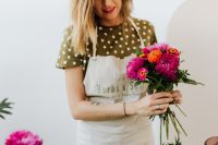 Kaboompics - Close-Up of a Florist Holding a Colorful Bouquet