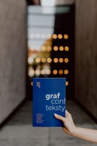 Kaboompics - The woman is holding books in her hands