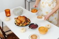 Kaboompics - Serving Glazed Carrots and Pumpkin Pie beside Roast Turkey