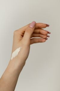 Kaboompics - Applying Hand Cream During Daily Skincare Routine