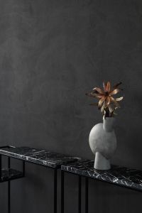 Kaboompics - Modern Black Marble Console with Dried Flower Arrangement and Charcoal Wall
