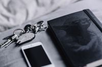 Kaboompics - iPhone, Moleskin notebook, keys