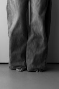 Kaboompics - Black Wide Leg Trousers in a Minimalist Studio
