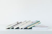 Kaboompics - Minimalist Stack of Books with White Space for Copy