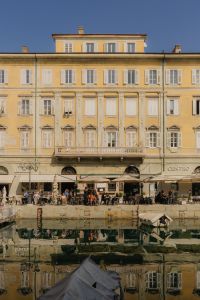 Kaboompics - Pastel Canal-Side Buildings Reflected in Calm Trieste Water