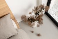 Kaboompics - Bed Corner with Dried Flowers and Morning Light