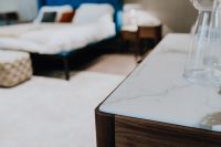 Kaboompics - Marble Top Wooden Commode with Glass Vase in Modern Bedroom