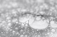 Kaboompics - Close-Up of Clear Liquid Bubbles in Cosmetic Foam, Shallow-Focus Macro Background