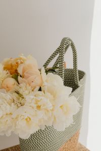 Kaboompics - Neutral Flower Arrangement with Patterned Woven Basket