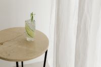 Kaboompics - Green Lime Cocktail on a Round Table
