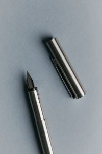 Kaboompics - Close-Up of Silver Fountain Pen With Nib