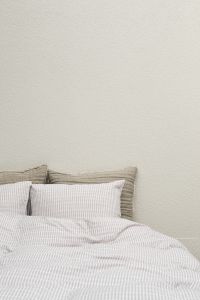 Kaboompics - Minimal Bed with Checkered Bedding