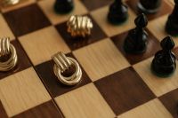 Kaboompics - Chessboard Detail With Gold Metal Pieces