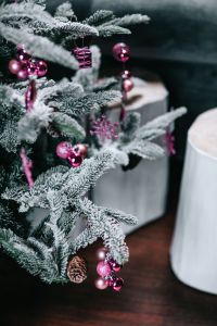 Pink Christmas Tree Decorations With Frosted Branches And Cozy Winter Decor