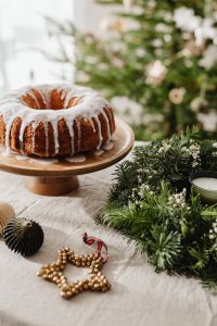 Kaboompics - Close Up of Iced Bundt Cake with Evergreen Decor
