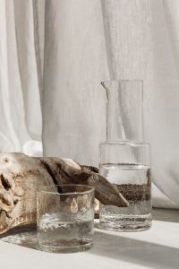 Kaboompics - Neutral Home Styling With Linen Curtains and Clear Glassware