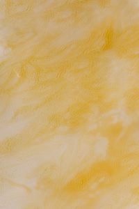 Kaboompics - Golden Skincare Cream Macro Texture with Soft Marbled Swirls