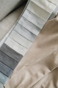 Kaboompics - Neutral Fabric Swatch Strip and Beige Textile