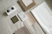 Kaboompics - Black Wood and White Fabric in Neutral Material Board