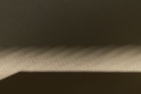 Kaboompics - Horizontal Beige Background with Bold Sunlight and Shadow