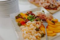 Kaboompics - Catering banquet table with different food snacks and appetizers