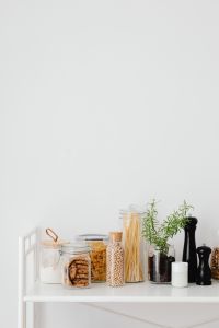 Kaboompics - Bright Kitchen Counter with Pantry Jars and Generous White Copy Space