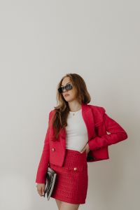 Woman in Pink Suit Looking Away