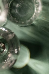 Kaboompics - Abstract Glass Refractions on Sage Green for Editorial Design