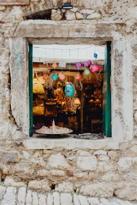 Kaboompics - Souvenir Shop Window in a Weathered Stone Facade, Rovinj