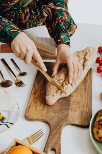 Kaboompics - Fresh Bread Slices on a White Table