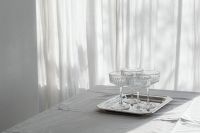 Kaboompics - Crystal Glassware on Silver Tray in Sunlight