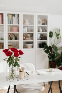 Kaboompics - Vertical Home Office Still Life with Red Roses, Planner, Pencil Cup and Coffee