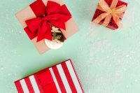 Kaboompics - Christmas Presents with Red Bows and Snowy Details