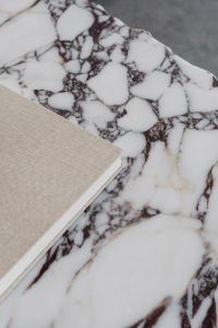 Kaboompics - Minimalist Book and Marble Surface with Neutral Stone Texture