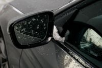 Kaboompics - Car Side Mirror with Snow and Rain Drops in Winter
