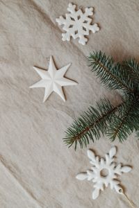 Kaboompics - Vertical Linen Christmas Background with White Star, Snowflake and Fir Branch