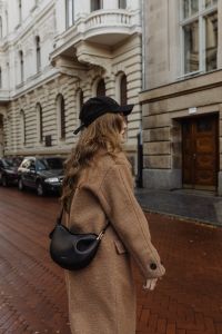Kaboompics - Woman in Camel Coat and Black Cap Walking on a City Street