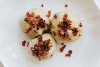 Kaboompics - Polish Comfort Food Close-Up of Pyzy with Browned Topping