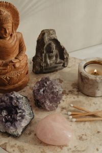 Kaboompics - Wooden Buddha Stone Statue Crystals And Candle Altar