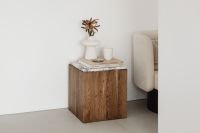 Kaboompics - Minimalist Interior with Walnut Side Table, Ceramic Decor and Upholstered Armchair