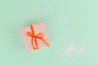 Kaboompics - Christmas gifts on a pastel green background