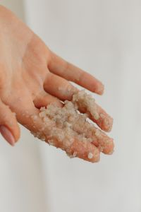Kaboompics - Handful of Coarse Sea Salt Body Scrub in an Open Palm