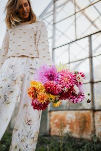 Kaboompics - Woman Holding Dahlia Bouquet At Greenhouse