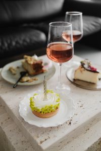 Kaboompics - Overhead Dessert Table with Wine and Cakes